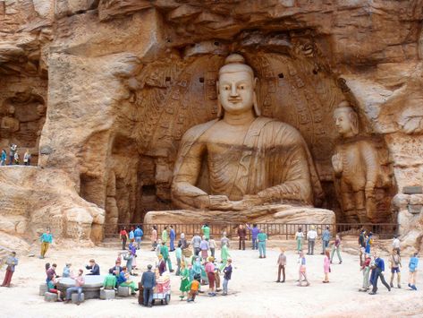 Mogao Caves, also known as Mogao Grottoes or the Caves of the Thousand Buddhas, are a collection of 492 caverns, built into the cliffs along China’s Dachuan River, home to a whole host of artwork from over 1,000 years. Constructed on these caves began around 366 AD, by Buddhist monks from several significant dynasties of China, up into the 14th century. Wanderlust Wednesday, Arte Yoga, China Map, Dunhuang, Tourist Information, Sacred Places, Famous Landmarks, China Travel, Buddhist Art