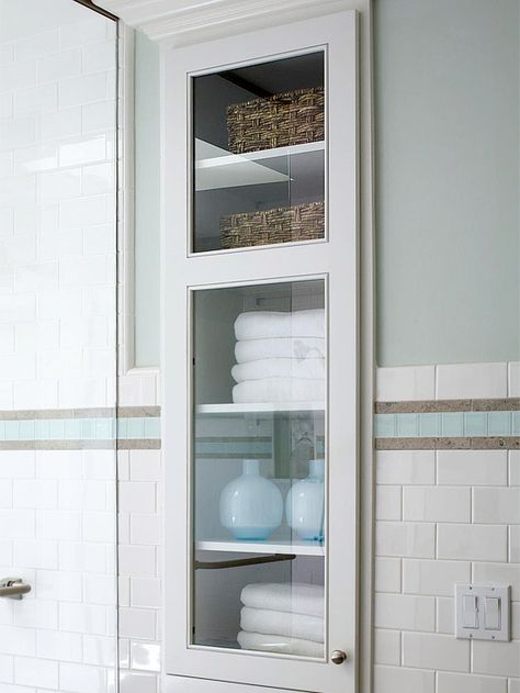 built between wall studs, behind the door in the tiny bath. This storage unit doesn't take up an inch of floor space. cabinet is recessed into the wall to boost storage in a small bathroom .  To make it uber-cheap, you could use a sturdy, reinforced picture frame/glass for the door. The glass is a lot thinner, so not for households with wee ones that tend to slam! Recessed Storage, Tiny Bath, Built In Cabinet, Subway Tiles, Bathroom Redo, Bad Design, Stud Walls, Bathroom Renos, Laundry In Bathroom