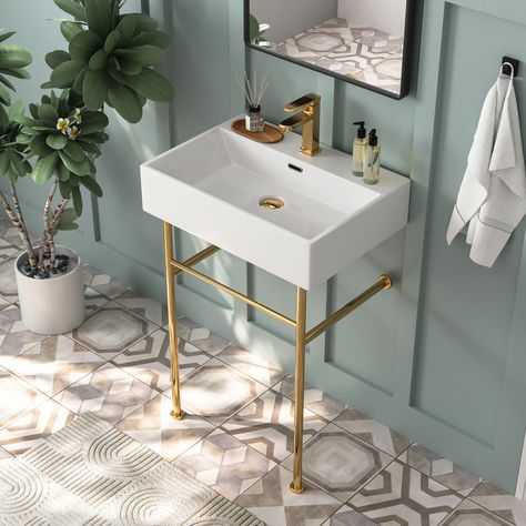 Crafted from premium ceramic, this console sink boasts exceptional scratch and stain resistance. Its spacious design allows for use by almost two people simultaneously, making it perfect for busy households. The open design adds a sense of space and openness to your bathroom. With 3 elegant color options to match your decor, the stainless steel console legs offer classic styling and convenient integrated front and side bars for towel storage. With an overflow, ergonomic design, and the perfect h Sink Legs, Bathroom Console, Console Bathroom Sink, Bathroom Sink Design, Bathroom Sink Tops, Rectangular Sink Bathroom, Rectangular Bathroom, Console Sink, Console Sinks