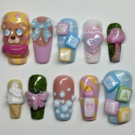 custom melanie martinez set!! they wanted a mix of portals, k-12, and cry baby! i had so much fun making this set and i tried a lot of new things 💗 #nails #nailsnailsnails #gelx #gelnails #gelxnails #melaniemartinez #crybaby #k12 #portals #explore #explorepage #trending #customnails #pressons Melanie Martinez Nail Art, Cry Baby Nails Melanie Martinez, Melanie Martinez Themed Nails, Melanie Martinez Nails Inspired Cry Baby, Melanie Martinez Nails Trilogy, Cry Baby Nails, Melanie Martinez Nails K-12, Melanie Martinez Inspired Nails, Melanie Nails