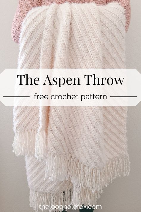 Embrace Hygge this season with the Aspen Throw, a crochet blanket pattern. This easy crochet throw blanket works up quickly, is beginner friendly and is perfect to cozy up in. You will love the diagonal ribbing and simplicity of the design. Created using only half double crochet stitches and sets of two row repeats, you'll be snuggled up in no time. Grab this free crochet pattern on The Loophole Fox. Motifs Afghans, Modern Haken, Zig Zag Crochet, Crochet Throw Pattern, Throw Blanket Pattern, Crochet Blanket Pattern Easy, Crochet Afghan Patterns Free, Half Double Crochet Stitch, Confection Au Crochet