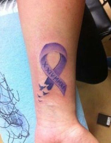 9 Most Captivating Purple Tattoo Designs | Styles At Life Domestic Vilonce Women, Domestic Vilonce Women Tattoos, Purple Tattoo Ink, Women Tattoos Ideas, Purple Ribbon Tattoos, Crohns Tattoo, Purple Tattoo, Purple Flower Tattoos, Purple Butterfly Tattoo