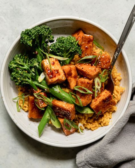 Spicy Maple Tofu Bowls with Golden Garlic Rice | The First Mess Steamed Broccolini, Maple Tofu, Vegan Weeknight Meals, Tofu Bowls, Main Recipes, Garlic Rice, Easy Vegan Dinner, Extra Firm Tofu, Tofu Recipes