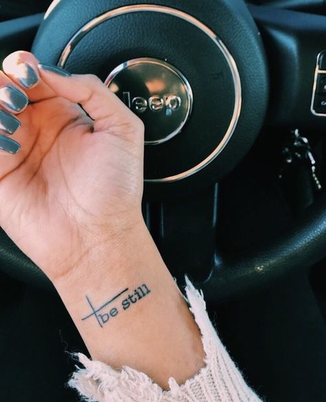 Christian Wrist Tattoos, Be Still Tattoo, Faith Tattoo On Wrist, Scripture Tattoos, Grace Tattoos, Tatuagem Masculina Pequena, Verse Tattoos, Cross Tattoos For Women, Faith Tattoo