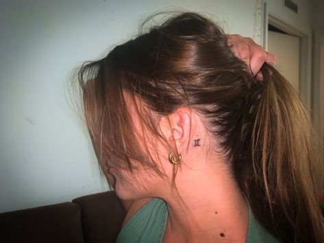 Behind Ear Tattoo Gemini, Initial Tattoo On Back Of Neck, Pisces Symbol Tattoo Behind Ear, Gemini Tattoo Behind The Ear, Zodiac Behind Ear Tattoo, Small Gemini Tattoo For Women Behind Ear, Pisces Ear Tattoo, Gemini Ear Tattoo, Peace Sign Tattoo Behind Ear