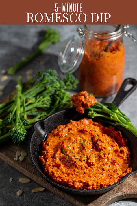 Romesco dip in a small black pan surrounded by broccoli spears, with a bottle of sauce in the background. Roast Capsicum Dip, Roasted Capsicum Dip, Roasted Vegetable Dip, Romesco Dip, Peppermint Crisp Tart, Homemade Sausage Rolls, Cauliflower Steak, Amazing Drinks, Peppermint Crisp