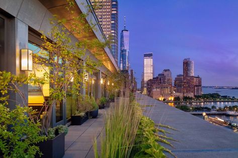 Views of the river can be seen from this striking Tribeca apartment. Tribeca Apartment, Manhattan Penthouse, Nyc Penthouse, New York Penthouse, Interesting Houses, Ocean Front Property, New Apartment Ideas, Sanaa Lathan, New York Harbor