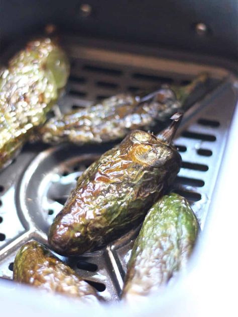 Learn how to make roasted jalapenos in your air fryer! Quick and simple, it's an easy way to add some Mexican spice to your favorite recipes. How To Roast Jalapenos, Roasted Jalapeños, Roasted Jalapenos, Fried Jalapenos, Mexican Spice, Frozen Chicken Nuggets, Roasted Jalapeno, Cooks Air Fryer, Mexican Spices