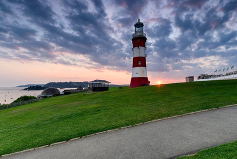 Sunset over Plymouth Hoe by flotsom. Sunset over Smeaton’s Tower the lighthouse that stands on the Hoe in Plymouth, Devon #AD #Hoe, #flotsom, #Sunset, #Plymouth Plymouth England, Lighthouse Painting, The Lighthouse, Leaning Tower Of Pisa, Plymouth, Devon, Textured Background, Lighthouse, Stock Photography