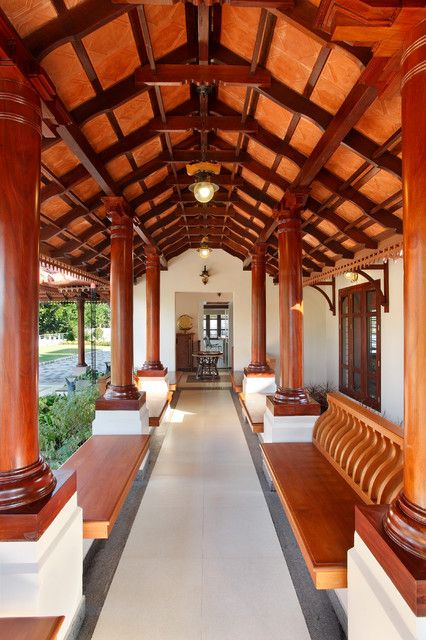 Traditional Bungalow In Kozhikode / Calicut - Indian - Veranda - Other - by Mrigank Sharma Photography | Houzz Traditional Bungalow, Small House Design Kerala, Chettinad House, Kerala Traditional House, Indian Houses, Wooden Pillars, Courtyard House Plans, Indian Home Design, Courtyard Design