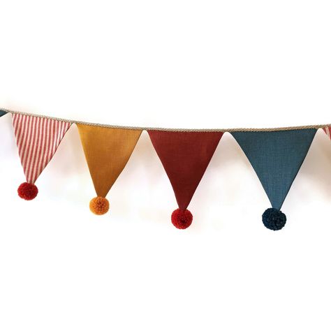 A custom made vintage circus themes inspired linen bunting garland for nursery, kids room or your celebration. Bunting banners are from 4 different linen colors (yellow, blue, red, white-red striped). Optional: with / without hand made alpaca yarn pom pom. COMPOSITION - linen - linen twine - additional: alpaca yarn pom poms. SIZE Each flag is ~13 x 13 cm (~5,11 x 5,11 inch). in 100 cm - 7 units in 200 cm - 14 units, etc. Circus Baby Room, Vintage Circus Nursery, Carnival Nursery, Vintage Circus Theme, Yarn Pom Poms, Felt Bunting, Baby Shower Bunting, Circus Decorations, Christmas Bunting