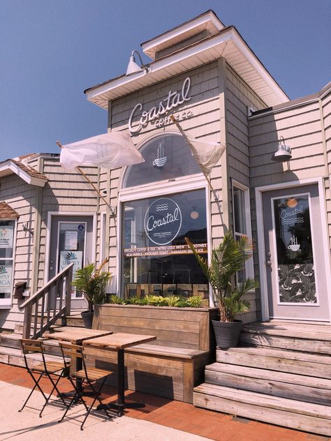 Coastal Grocery Store, Beach Local Aesthetic, Aesthetic Coffee Shop Exterior, Lakeside Coffee Shop, Beachside Cafe Aesthetic, Beach Coffee Shop Design, Beach Town Shops, Cafe Beach Aesthetic, Florida Coffee Shop