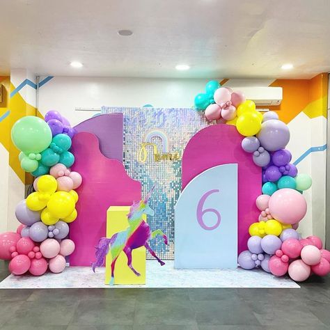 Koachellah Parties on Instagram: "Nimi at 6 Sometimes, we just hop on our unicorn and fly somewhere over a rainbow, leaving a little bit of sparkle everywhere we go! #NeverBasic #unicorn #unicorns #rainbow #rainbows #sparkle #shine #shimmerwall #balloons #birthdaygirl #kidsparty #magic #balloongarland #photowall #backdrop #partystyling #stylishkidsparties #eventstyling #eventdesign #JoyMakers #CreatingMagicalMemories #KoachellahMagic #KoachellahParties #KoachellahDidIt" Sparkle Unicorn Birthday Party, Unicorn Party Backdrop, Animal Dance, Unicorn Backdrop, Stitch Birthday, Unicorn Themed Birthday Party, Unicorn Balloon, Shimmer Wall, Girl Birthday Decorations