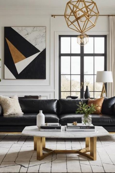 Modern living room with black leather sofa, geometric artwork, and gold accents. Black White Cognac Living Room, Black White And Cognac Living Room, White And Tan Living Room, Tan Living Room Ideas, Contrast Bedroom, Living Room 2 Sofas, Living Room Decor Black, Modern Chic Living Room, Ensuite Bathroom Designs