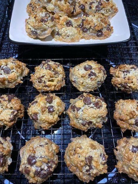 Keto magic Cookies Ingredients: 4 Egg Yolks 1 Tbsp. Butter 3 ½ Tbsp. Coconut Oil ⅓ Cup Confectioners Swerve 1 Cup Unsweetened Coconut Flakes Heaping ⅓ Cup Chopped Pecans Heaping ⅓ Cup Chopped Walnuts ⅔ Cup Semi Sweetened Chocolate Chips Directions: 1. So, the first thing you'll want to do is preheat your oven to 350 °F (176°C). Then, you'll want to separately melt your butter and coconut oil in the microwave for about 15-30 seconds depending on your microwave wattage. Lastly, in this step Keto Magic Cookies, Magic Cookies, Free Keto Meal Plan, Quick Treats, Low Carb Easy, Low Carb Baking, Keto Cookies, Low Carb Meals Easy, Recipes For Beginners