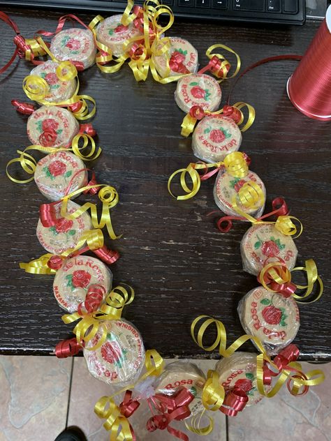 Graduation Leis Mexican, Graduation Lays Ideas, Hot Cheetos Lei For Graduation, Mexican Graduation Lei, Mexican Leis For Graduation, Graduation Leis Candy, Graduation Necklace Candy, Graduation Necklace Ideas, Chicano Graduation Cap