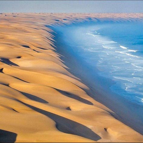 The Namib desert runs into the Atlantic Ocean. Namibia, Southwest Africa Desert And Sea, Namibia Desert, Namib Desert, Desert Life, Desert Island, Travel Adapter, Sand And Water, Beautiful Photos Of Nature, Most Beautiful Cities