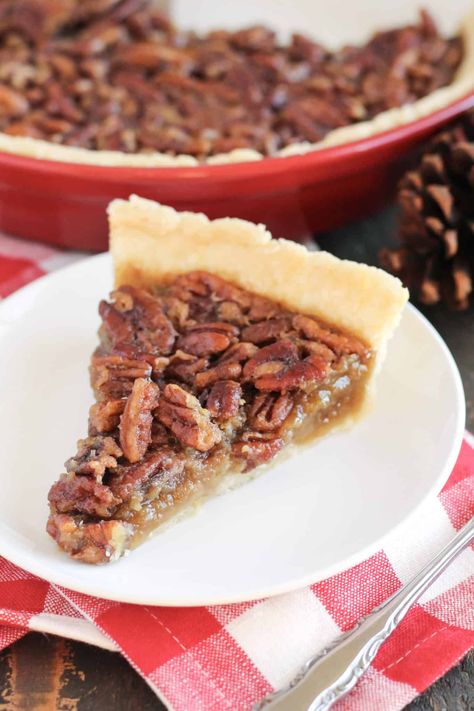 The best Thanksgiving or Christmas dessert is always pie, and pecan is my favorite. Too nervous to make homemade gluten-free pie crust? Don't be! Follow along with this easy recipe, and the use of your food processor, to make a beautiful homemade Pecan Pie. Also made with no corn syrup, this Pecan Pie is nutty, buttery, and sweet, and will quickly become a family favorite! Original Pecan Pie Recipe, Karo Pecan Pie, Pecan Pie Tarts, Gluten Free Pecan Pie, Gluten Free Pecan, Homemade Pecan Pie, Best Pecan Pie, Pecan Pie Filling, Gluten Free Pie