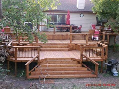 The Complete Guide About Multi Level Decks with 27 Design Ideas | Decks ... Two Level Deck, Multi Level Deck, Tiered Deck, Hot Tub Deck, Hot Tub Backyard, Patio Deck Designs, Wooden Deck, Stamped Concrete Patio, Deck Designs Backyard