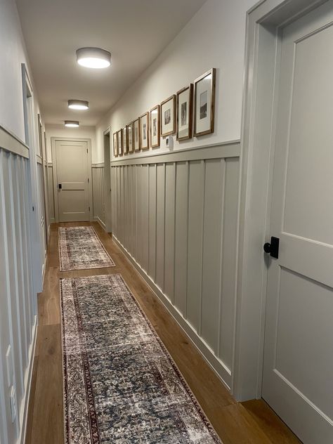 Tall Hallway Panelling, Wainscoting Small Hallway, Dark Board And Batten Hallway, Hallway With Board And Batten, Wayne’s Coating Hallway, End Of Hallway Built In, Entryway With Board And Batten, Small Hallway Panelling Ideas, Hallway Renovation Ideas