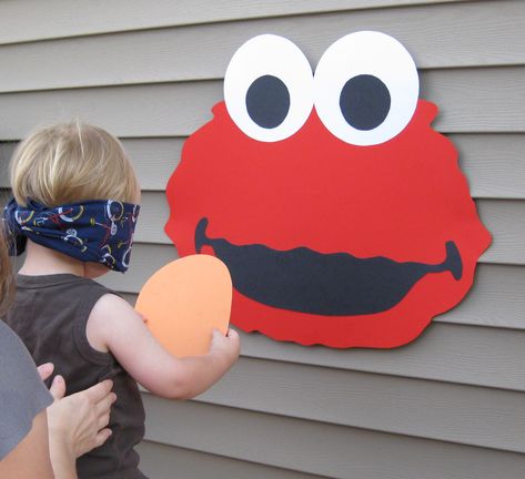 Elmo Birthday Party: Pin the Nose on Elmo Made with Colored Construction Paper Elmo Birthday Party Ideas, Sesame Street Birthday Party Ideas Boy, Elmo Birthday Party Boy, Birthday Party Game, Elmo Birthday Party, Birthday Party Games For Kids, Second Birthday Ideas, Sesame Street Birthday Party, Elmo Party