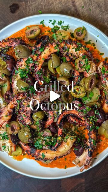 Rocco Gizzo on Instagram: "Fork Tender Grilled Octopus | I’m not lying when I say this octopus is fork tender… if you don’t believe me, watch the video to find out!  🐙Octopus🐙 -1 Whole Octopus (2-3lbs)  -Parsley Stems -1 lemon -Small palmful black pepper  🫒Vinaigrette🫒 -2tbsp EVOO -1/2 lemon, juiced -1 tbsp oregano  -1/4 tsp red pepper flakes  -Splash red wine vinegar  -Parsley -Salt  🫑 Romesco 🫑 -1 jar roasted red peppers -Handful fresh parsley  -1/4 cup cherry peppers -1/4 cup almonds, toasted -2 garlic cloves, smashed -2 tbsp red wine vinegar -1 tsp smoked paprika  -1/4 tsp red pepper flakes, -Salt, to taste -1/4 to 1/3 cup EVOO  Add all the romesco ingredients to a blender, and blend until emulsified. Then set aside in the fridge.   Remove the beak and eyes from the octopus and r Grilled Octopus Salad, Baked Octopus Recipes, Octopus Marinade Recipe, Whole Octopus Recipes, Octopus Recipes Grilled, Octopus Appetizer, Mackerel Fillet Recipes, Italian Octopus, Octopus Dishes