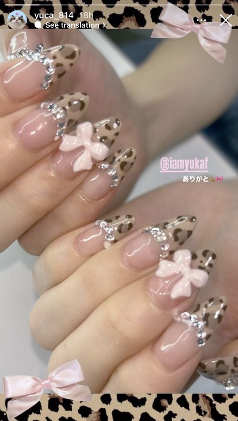 Winter Gyaru Nails, Nails Ideas Charms, Leopard Design Nails, Cheetah Nails With Bow, Cat Sticker Nails, Hime Gyaru Nails, Korilakkuma Nails, Nails With Lots Of Charms, Neapolitan Nails