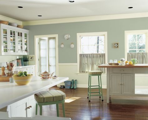 classic country kitchen: cabinet mix glass and beadboard, wood and quartz counters, wood floors, paint Cascade Green (SW 0066) Sage Green Kitchen Walls, Green Kitchen Paint, Cascade Green, Green Kitchen Walls, Timeless Paint Colors, Paint For Kitchen Walls, Sage Green Kitchen, Kitchen Green, Green Kitchen Cabinets