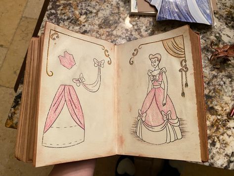 diy Cinderella sewing book from Disney movie showing pink dress sewing patterns pink Cinderella dress with book display Disney cartoon replica book Cinderella Sewing, Cinderella Crafts, Cinderella Bedroom, Cinderella Room, Disney Room Decor, Cinderella Birthday Party, Disney Dinner, Disney Furniture, Princess Book