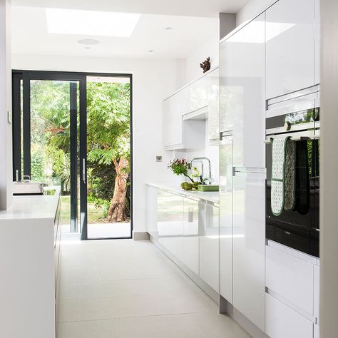 Tired of being split between separate rooms, the owners sacrificed half their living room and a conservatory to build this huge open-plan kitchen White Galley Kitchen, Galley Kitchen Ideas, Galley Kitchen Layout, Kitchen Galley, White Gloss Kitchen, Galley Kitchen Design, Gloss Kitchen, Galley Style Kitchen, Galley Kitchens