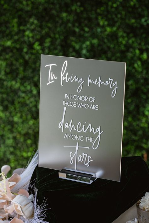 Click on the following link to browse HUNDREDS more designs in our shop!! https://pinkposiesandpearls.etsy.com/  In Loving Memory In Honor Of Those Who Are Dancing In Heaven Modern Clear Glass Look Acrylic Wedding Memorial Sign, SIG-DH5                                          | Welcome to Pink Posies and Pearls Wedding and Gift Boutique | | THE PRODUCT | *We love the clean lines of this clear acrylic In Loving Memory sign. We can print these signs in ANY color! Choose a color from the swatches image or let us know your custom color you would like printed (all but metallics). We offer clear stands. *.    This acrylic is a display material that is strong, moisture resistant & visually clearer than glass, not to mention shatterproof! *.    Need this in different wording? No problem! Put your Take A Glass Wedding Sign, Glasses For Wedding Reception, In Loving Memory Cricut Ideas, Diy Wedding Memorial Ideas, Dancing In Heaven Wedding Sign, Under The Stars Wedding Decorations, Wedding In Memory Sign, In Memory Wedding Sign, Memorial Signs For Weddings