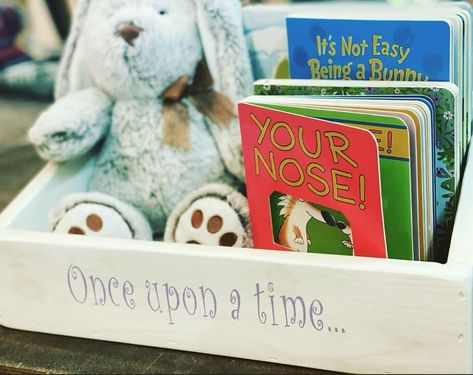 Rustic Ranch Creations on Instagram: “Our rustic book boxes are perfect for Easter gift boxes! 🐣 🐰 📖 #eastergift #easterbasketideas #nurserybox #babybookbox #babyshowerbooktheme…” Baby Shower Book Basket, Books For Baby Shower Display, Nursery Book Storage, Nook Nursery, Book Crate, Record Crate, Book Bin, Rustic Books, Easter Gift Boxes