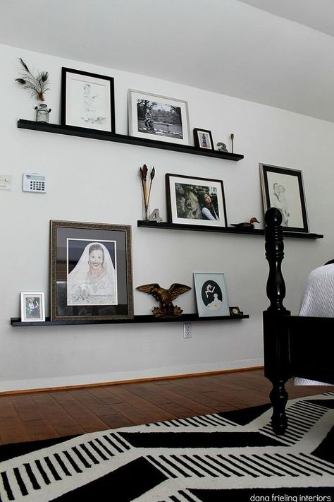 Here's a great way to fill that big, empty wall of yours...hang picture ledges from floor to ceiling and fill them with various sized art pieces. Picture Ledge Display, Horizontal Mirror, Ikea Picture Ledge, Picture Ledges, Photo Ledge, Picture Wall Bedroom, Photo Shelf, Floating Shelves Bedroom, Picture Rail