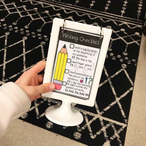 Guest Post: Mini Anchor Charts for IKEA Frames by Move Mountains in Kindergarten | Sweet for Kindergarten Ikea Tolsby Frame Ideas Classroom, Mini Anchor Chart Stand, Ikea For The Classroom, Ikea Frames Ideas, Mini Anchor Charts, Desk Anchor Chart, Anchor Charts Kindergarten, Anchor Chart Display, Ikea Photo Frames