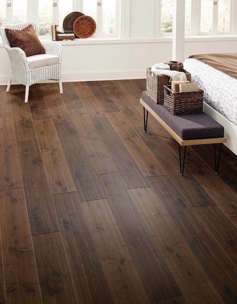 Focus on longevity without sacrificing stability with this Wassila Valley Walnut Hand Scraped Water-Resistant Engineered Hardwood engineered hardwood! The durable core allows engineered hardwood to be installed on all levels of your home. Hand scraped engineered hardwood floors are contoured to display the woods natural characteristics and unique qualities. Extra texture and definition are added to the surface of the plank before it's finished with the final top coat. Engineered hardwood is real Dark Hardwood Floors Living Room, Walnut Wood Floors, Hardwood Flooring Ideas, Wood Floor Colors, Cherry Wood Floors, Wood Plank Flooring, Hardwood Floors Dark, Lvp Flooring, Floor And Decor