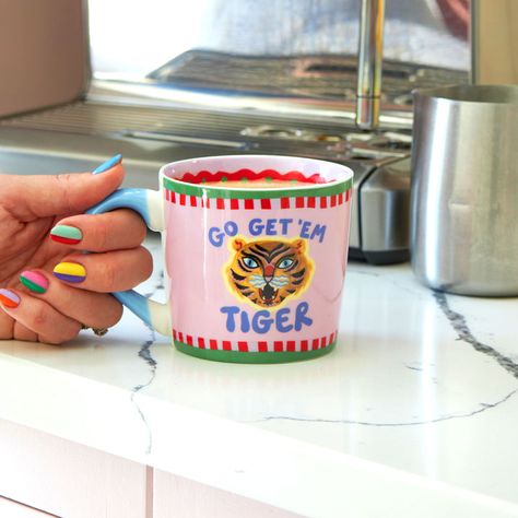 Mugs – Eleanor Bowmer Eleanor Bowmer, Go Get Em Tiger, Go Get Em, Pastel Pink Background, Tiger Illustration, Cool Office, Go For It, The Tiger, Green And Red