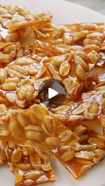 Martha Stewart on Instagram: "The perfect balance between salty and sweet, our peanut brittle recipe is made with only five ingredients: peanuts, granulated sugar, butter, baking soda, and salt. There’s no corn syrup in our peanut brittle, giving it a true old-fashioned flavor and texture. It’s customizable too: If peanuts aren’t your thing, make it with cashews or almonds instead. Get the recipe at the link in our bio." Sugar Free Peanut Brittle, Almond Brittle Recipes, Peanut Brittle Recipe Old Fashioned, Peanut Brittle Recipe Easy No Corn Syrup, Seed And Nut Brittle, Peanut Brittle Without Corn Syrup, Martha Stewart Peanut Brittle, Buttery Cashew Brittle Recipe, Costco Nut And Seed Brittle Recipe