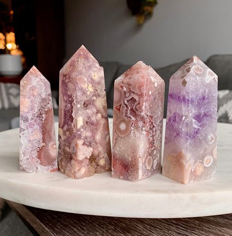 Selection of high quality, mini druzy pink and purple amethyst flower agate towers. Lots of druzy elements on these. Tower C has a natural druzy tip/is not broken/chipped. Natural, imported stone/crystal products from Madagascar. Tower A Height: 3 inches Weight: 80 grams Tower B Height: 3.6 inches Weight: 126 grams Tower C (natural druzy tip - not broken) Height: 3.2 inches Weight: 122 grams Tower D Height: 3.4 inches Weight: 113 grams "Pink amethyst flower agate emits calmness, trust and grace. Crystals Aesthetic, Crystal Products, Crystal Healing Chart, Geode Rocks, Crystal Towers, Amethyst Flower, Crystal Aesthetic, Pink And Purple Flowers, Pretty Rocks