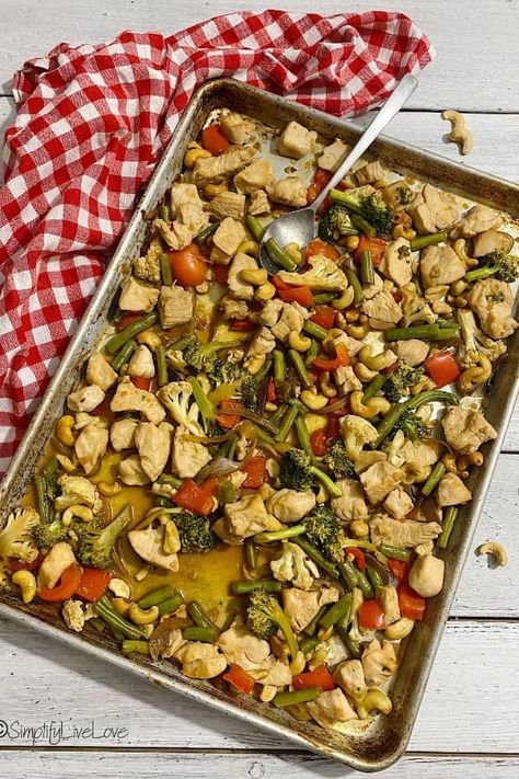 Need healthy dinner inspiration? We love this delicious sheet pan cashew chicken!! Full of fresh vegetables and lots of flavor, this is one meal you won't want to miss. Skip the Chinese Take-Out and make this instead! #sheetpandinner #chickenrecipe #sheetpan Sheet Pan Cashew Chicken, Sheet Pan Dinners Chicken, Tamari Sauce, Salmon And Asparagus, Ginger Nut, Chicken Sweet Potato, Cashew Chicken, Broccoli Cauliflower, Pan Chicken