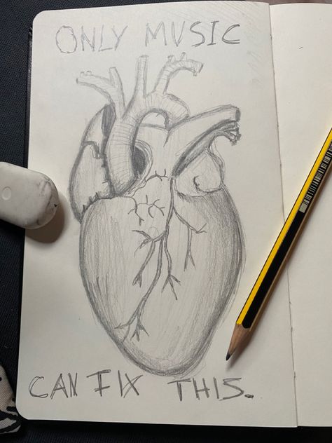 You can see a drawing of a heart, in the middle of the picture. It’s in black and white. Next to the heart there is a writing: “only music can fix this.” There’s a pencil and a rubber laying aside of the sketchbook. Things To Draw After A Breakup, Simple Breakup Drawings, Lost Draw Feeling Sketch, Meaningful Drawing About Love, Lost Draw Feeling, Feeling Left Out Drawing, Him Aesthetic, Heart Sketches, Graphic Pictures