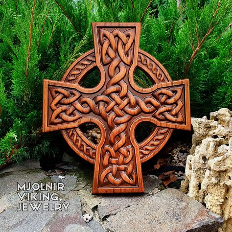 Wood сeltic сross Embrace the timeless elegance of our Celtic Cross Wood Carving, a stunning piece of decor that seamlessly blends Celtic and Norse artistry ✧ Material: oak ✧ Height: 13,7 inches (35 cm) This oak wall panel, designed for wall hanging, features intricate woodwork that faithfully replicates the famous cross from Brompton, London. Crafted from high-quality oak, this Celtic Cross wall hanging is more than just a decorative item—it's a symbol of rich cultural heritage and crafts... Intricate Woodwork, Cross Wall Hanging, Cross Wood, Oak Wall, Cross Wall, Celtic Art, Celtic Cross, Wall Crosses, Celtic Designs