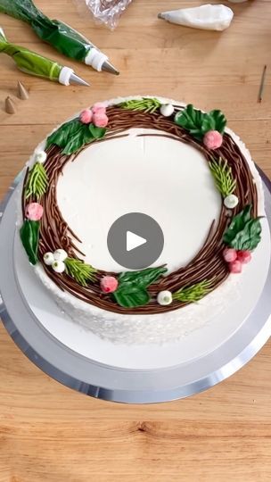 21K views · 1.5K reactions | A buttercream wreath is an easy decoration to dress up your holiday cakes.  I started with chocolate buttercream to create the branch base then filled the space with evergreen. Create berries by piping rounds of red icing on parchment, chilling and then rolling them in fine sugar. #cakedecorating | Dan Langan | Lindsey Stirling · Dance Of The Sugar Plum Fairy Chocolate Wreath, Red Icing, Sugar Plum Fairy, Lindsey Stirling, Chocolate Buttercream, Holiday Cakes, Sugar Plum, Stirling, Simple Decor