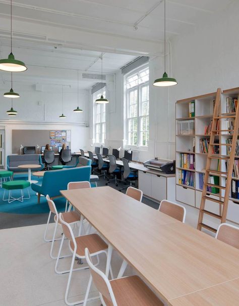 Bright, light and contemporary staff room at Charles Dickens School, Kent by Contents Design, Newcastle. The staffroom within this old Victorian school in Southwark was designed to retain talent and promote collaboration between staff. The interior scheme has an apartment feel rather than an institutional one. This project was selected as a RIBA case study in their ‘Future Schools’ publication. Teachers Lounge Makeover, Staff Lounge, Student Lounge, Classroom Interior, Teachers Room, Study Room Design, Teachers Lounge, Joinery Design, Student Room