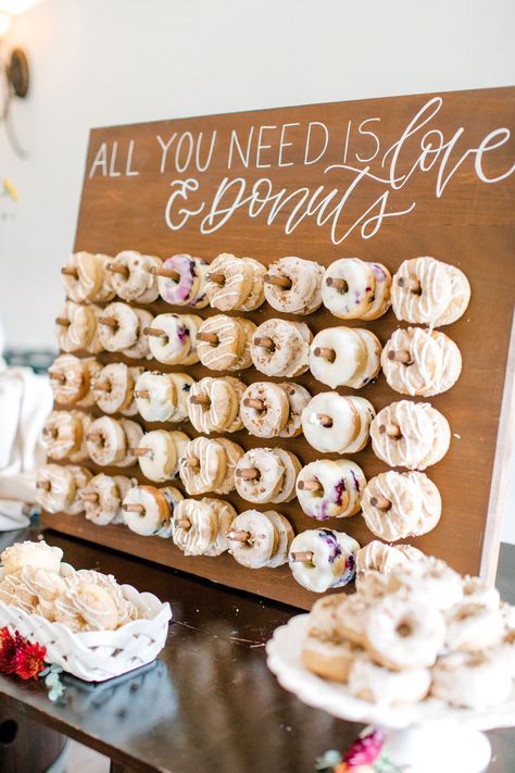 Donuts Wall Wedding, Fall Wedding Donut Bar, Wedding Donut Bar Dessert Tables, Donut Board Wedding Display, Donut Wall Wedding Dessert Tables, Donut Peg Board Wedding, Wedding Reception Donut Bar, Decorated Donuts Ideas Wedding, Wedding Dessert Station Ideas