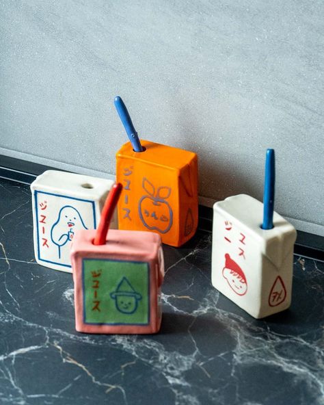 Who said juice boxes were just for kids? 🧃⁠ ⁠ Meet these handcrafted Clay Juice boxes, homages to Japanese design, doubling as a unique holder for your writing tools or a standalone statement piece. ⁠ Get ready to spruce up your shelves with a sip of style! ⁠ ⁠ Check them out on ta-daan.com⁠ ⁠ #tadaan #craftsmanship #ClayCreation #DeskDecor #JapaneseFlair @fuyu.art_