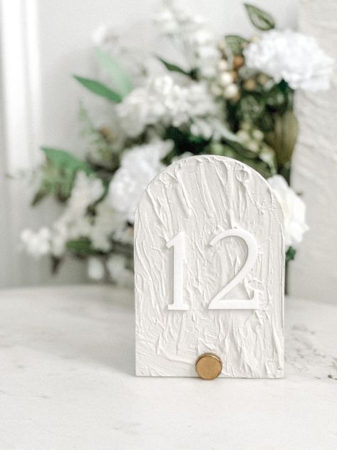 Stone Signage Table Numbers, Marble Table numbers, Personalized 3D Table Numbers, 
Arch Table Numbers | Table Numbers | Acrylic Table Numbers | Table Number Wedding , Centerpieces Luxury Decorations, Wedding Table Number,
#stonetablenumbers #stone signage #weddingsignage #weddingsigns #weddingdecor #weddingtablenumbers Unique Wedding Table Numbers Ideas, Plaster Table Numbers, Table Markers Wedding, Travertine Wedding Table Numbers, Marble Table Numbers, Pearl Table Numbers, Stone Wedding Table Numbers, Rehearsal Dinner Table Decor, Stone Table Number