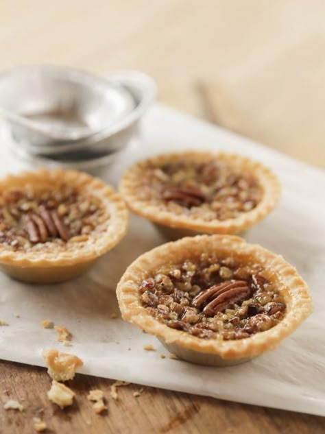 Get Mini Pecan Pies Recipe from Food Network - Pioneer Woman Pioneer Woman Pecan Pie, Mini Pecan Pie Recipes, Mini Pecan Pie, Pecan Pie Tarts, Maple Pecan Pie, Pecan Pie Bites, Food Network Recipes Pioneer Woman, Ree Drummond Recipes, Dessert Mini