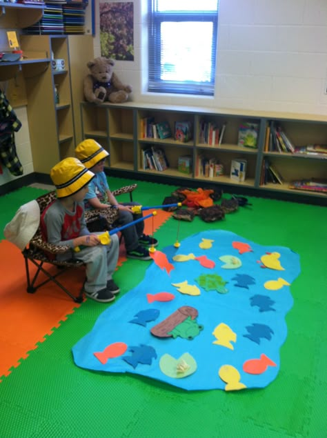 Fishing for paper fish! Paper clips on fish and magnetic poles--preschool fun! Fishing Game Preschool, Fishing Pole Craft Preschool, Fishing Activity Preschool, Fish Dramatic Play, Camping Week Preschool Crafts, Camp Day Kindergarten, Fishing Preschool Crafts, Fishing Dramatic Play For Preschool, Pond Dramatic Play Preschool