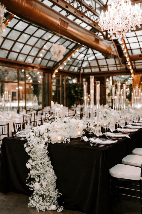 Elegant black and white reception decor with baby's breath, candlelight and black linens. Spotlight WiH Partners- Photography: Erika Geier Photography Guest Accommodations: Grand Galvez #WeddingsinHouston #RealWedding #DestinationWedding #BeachWedding #WeddingInspiration #Reception #ReceptionDecor #WeddingDetails Black And White Wedding Food Table, Ceremony Backdrop Black And White, Black And Wood Wedding Decor, Bridal Ideas Wedding, Classy Wedding Reception Decorations, Black And White Wedding Theme Table Decor, Moody Black And White Wedding, Black Table Cloths Wedding Receptions, Black White And Copper Wedding