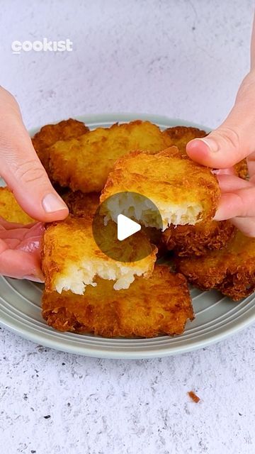 Cookist Wow on Instagram: "Super #crunchy and quick to prepare 🤤 The recipe to make the BEST #potato nuggets EVER 🙌❤️

👉INGREDIENTS
1 onion
4 potatoes
35g (1/4 cup) of cornstarch
Salt
Oil for frying

👉METHOD
1. Grate the onion and potatoes and transfer to the pan with oil. Fry for a few minutes until becomes soft. Remove from heat and transfer to the bowl.
2. In a bowl with potato and onion add the corn starch and salt and mix with a spatula to combine.
3. Take the mixture with the spoon and make a shape with the hands. Transfer to the cutting board and make the nuggets shape.
4. Transfer them to the pan with hot oil and fry until they are golden brown on both sides.
5. Serve them all together on a serving dish and dip in mayonnaise.

What sauce would you dip them into? 😋👇

#cookistw Fried Potatoes And Onions, Potato Nuggets, Potato Pancake, Cookist Wow, Potato Recipes Side Dishes, Potato Pancakes, The Onion, Frying Oil, Hot Oil